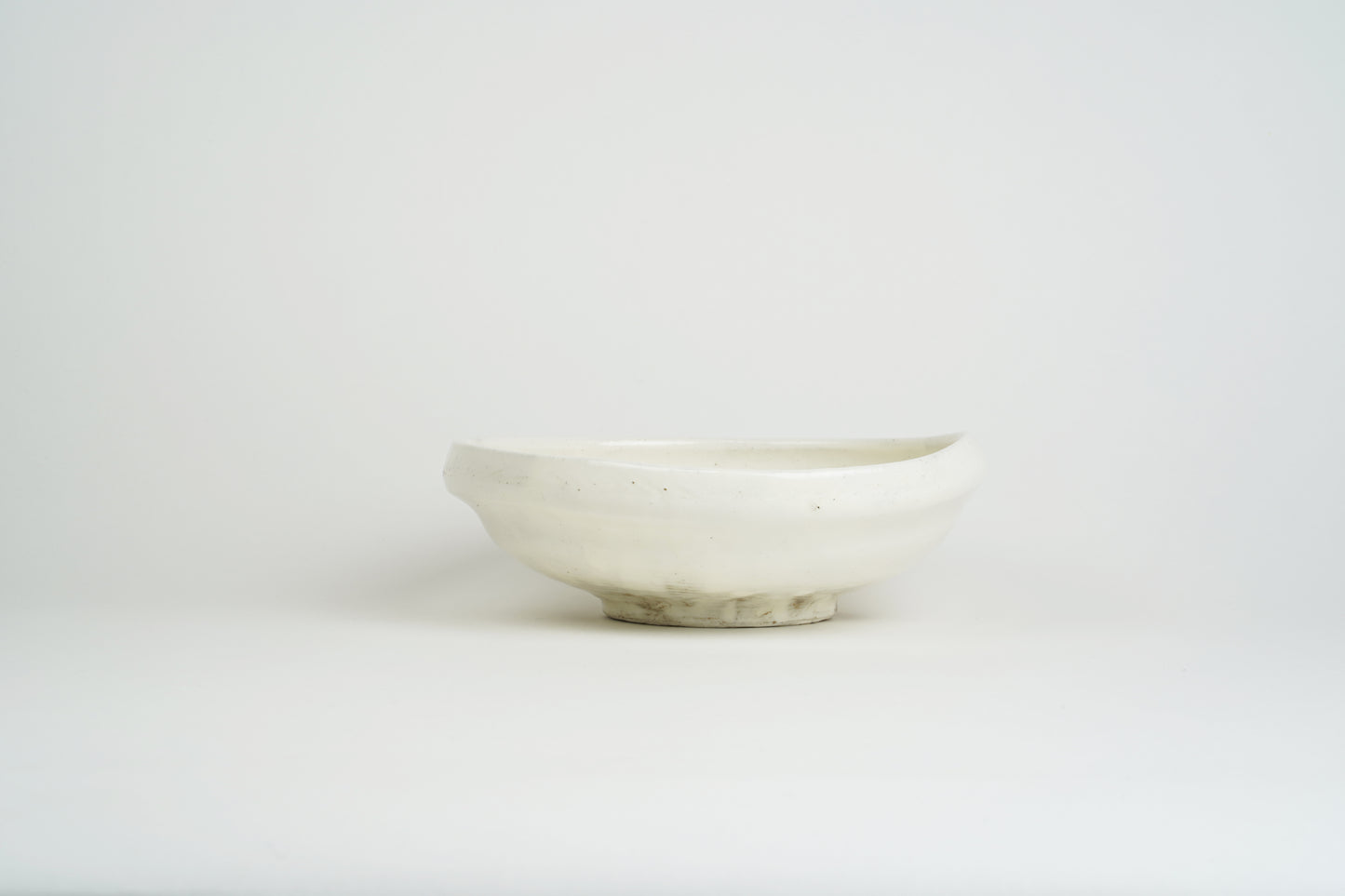 Powder-drawn single-sided pressing bowl