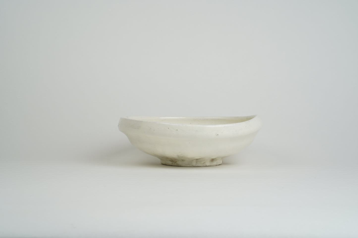 Powder-drawn single-sided pressing bowl