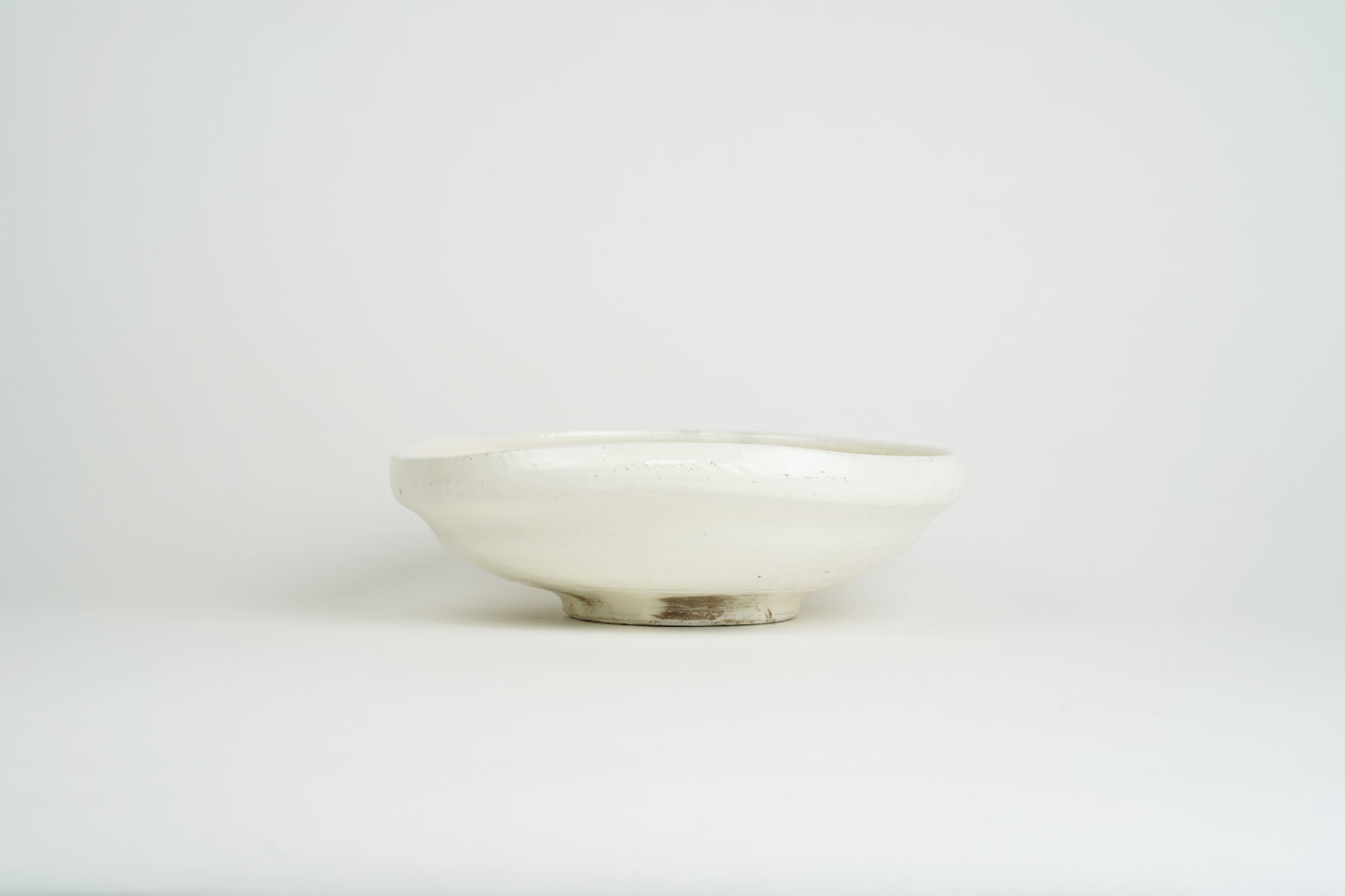 Powder-drawn single-sided pressing bowl