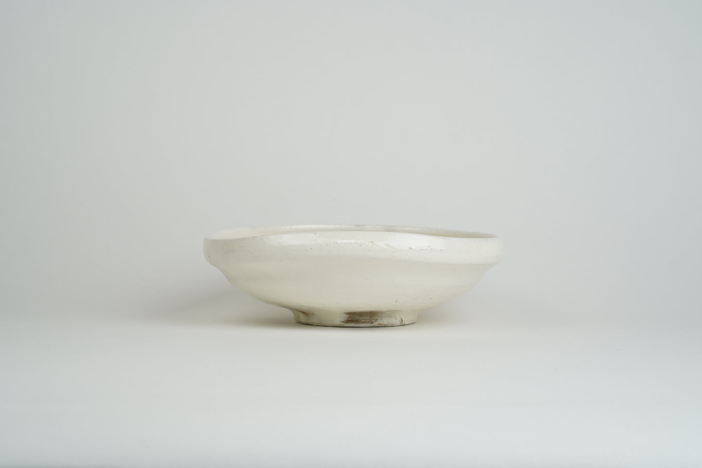 Powder-drawn single-sided pressing bowl