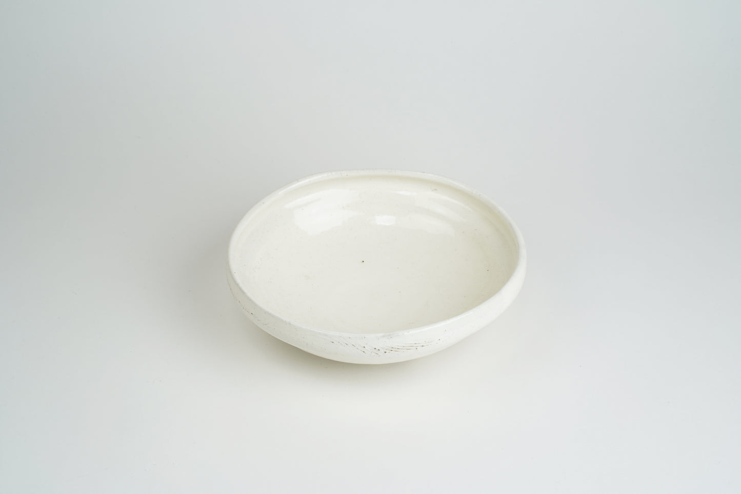 Powder-drawn single-sided pressing bowl