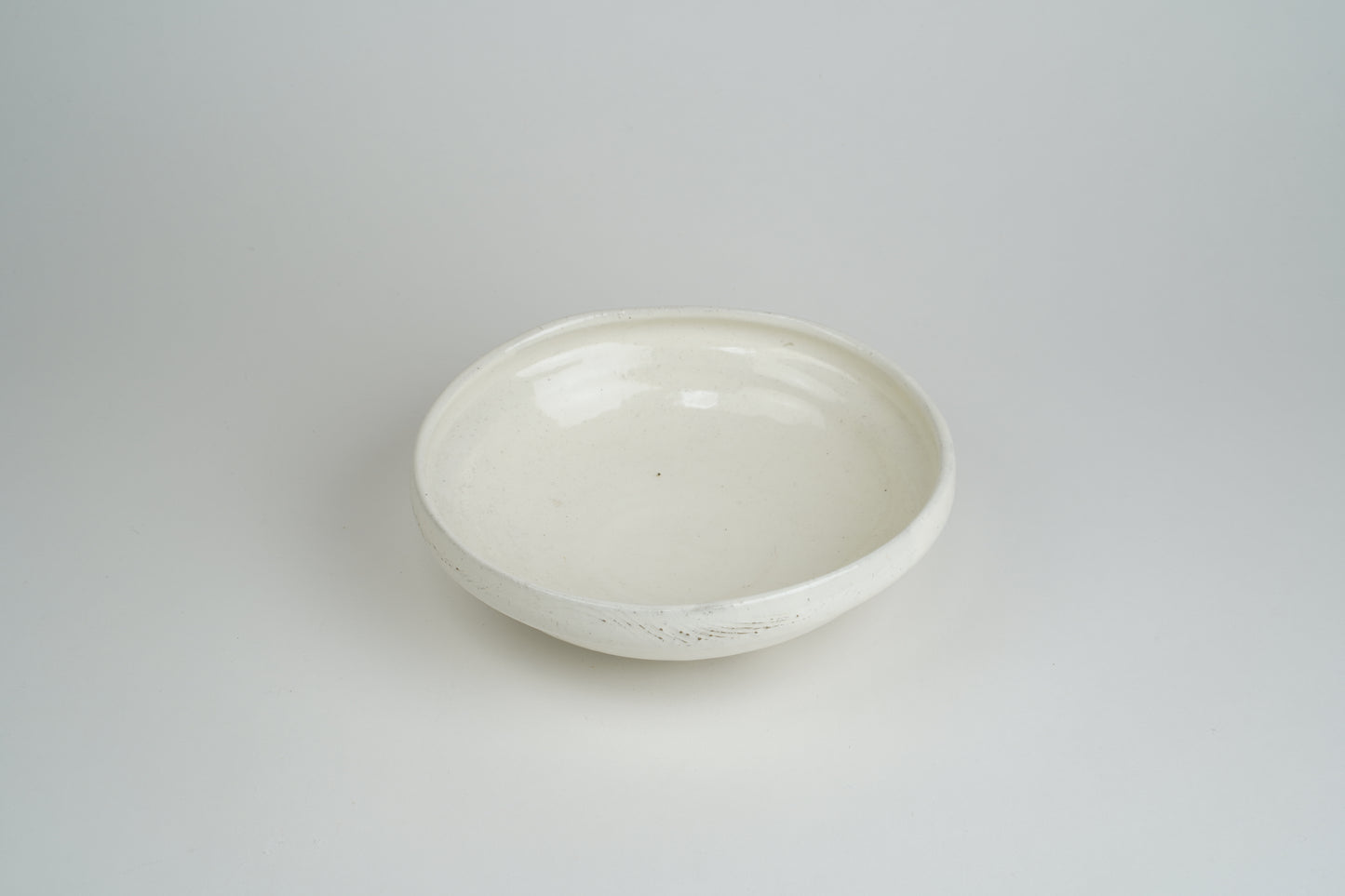 Powder-drawn single-sided pressing bowl