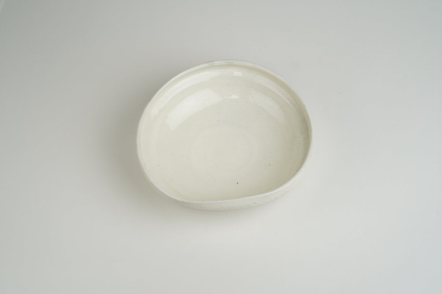 Powder-drawn single-sided pressing bowl