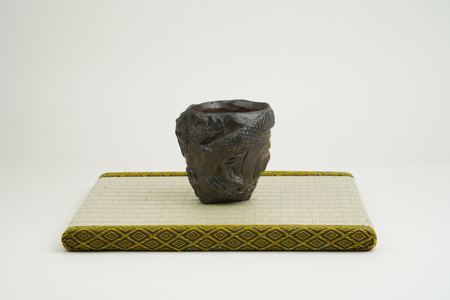 Black Bizen Dragon Carved Sake Cup
Unseen Power