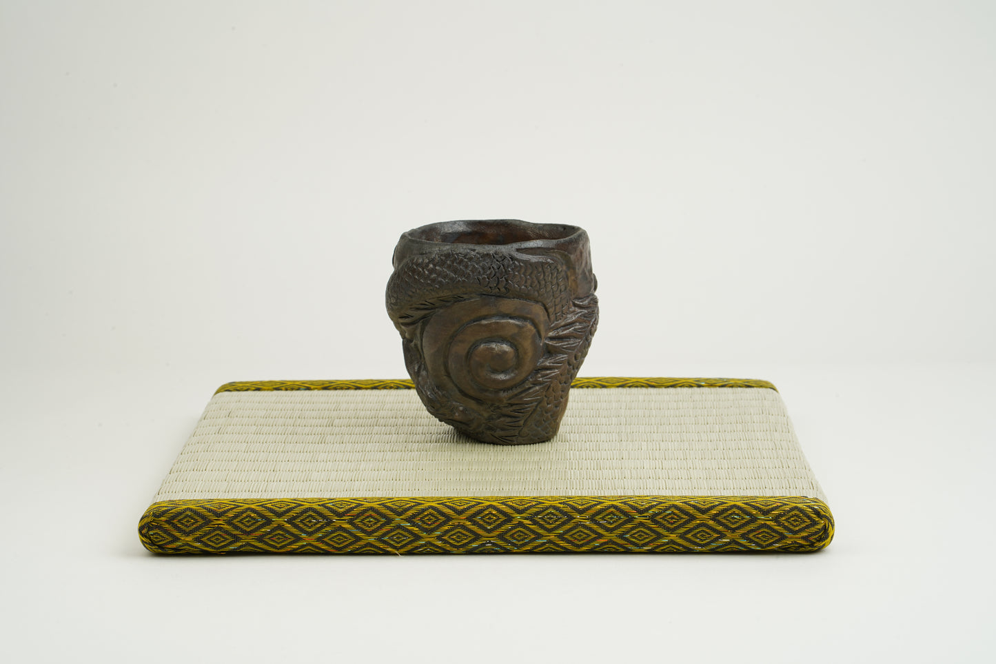 Black Bizen Dragon Carved Sake Cup
Unseen Power