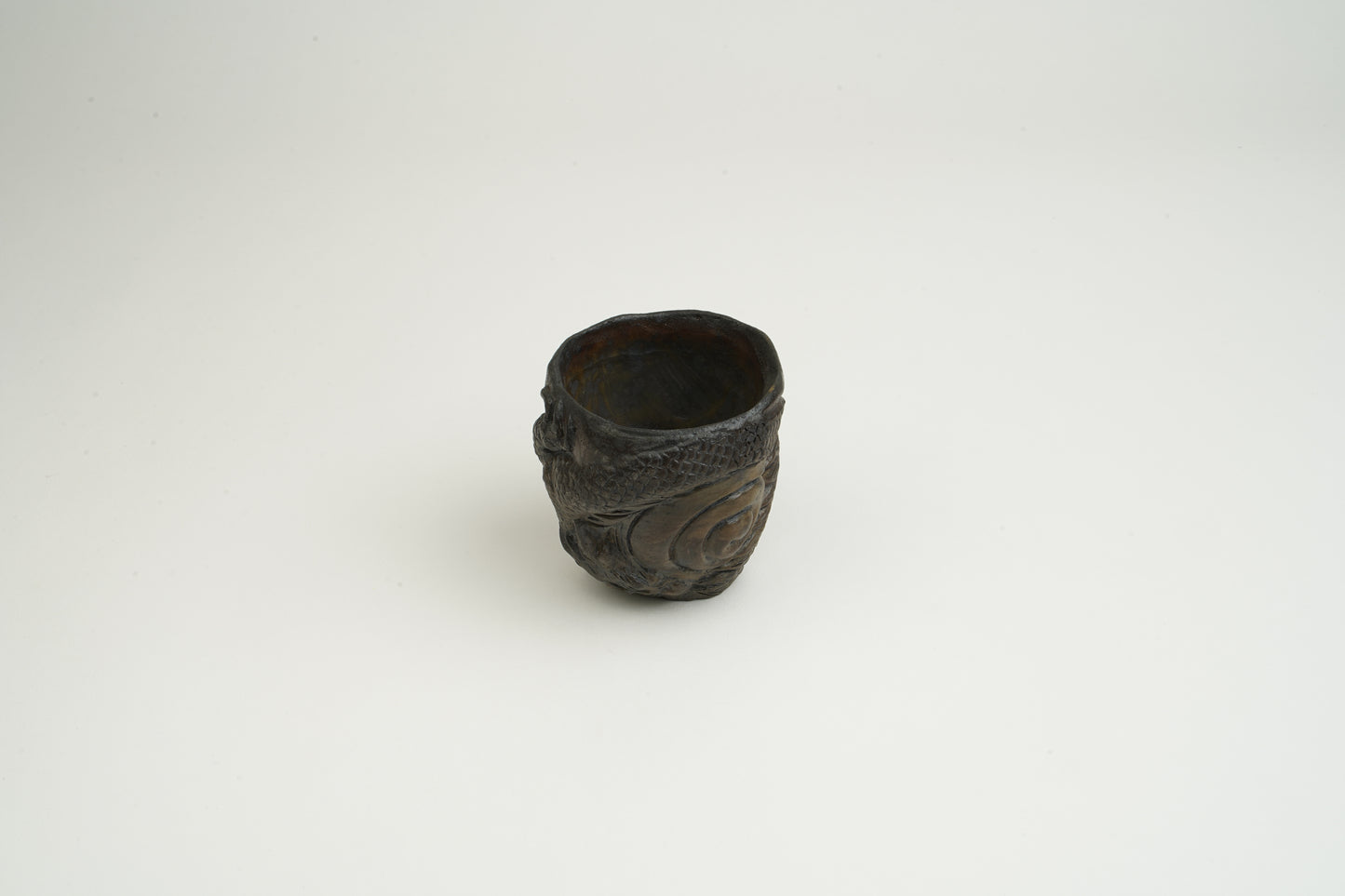 Black Bizen Dragon Carved Sake Cup
Unseen Power